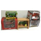 5 die cast tractors- Ertl, etc. M.I.B.