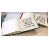 2 hingeless U.S. stamp albums- mostly mint