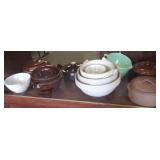 Large group of stoneware, mixing bowls, covered