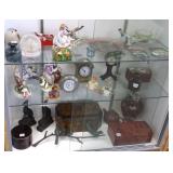 Group decorative items including clocks, figures,