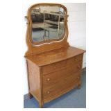Antique oak 4-drawer dresser with beveled mirror