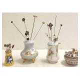 Group of hat pins/ stick pins in holders including