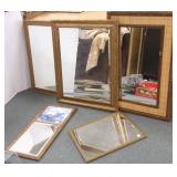 5 assorted framed mirrors