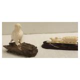 4" ivory eagle on fossil ivory base & a 5 1/2"