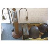 Trench art lamp, military helmet with liner,