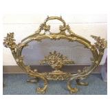 Ornate brass firescreen