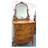 Antique dresser with beveled mirror