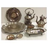 Group of ornate silverplate trays, tea set, etc.