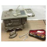 Antique iron toy stove with mini violin, etc
