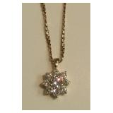 14k pendant on chain set with 9 diamonds approx