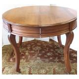 Antique Victorian round dining table with 3 leaves