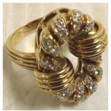 Designer style 14K ring set with many diamonds
