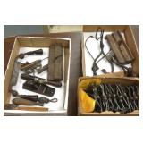 Group of early tools including tongs, planes,