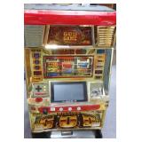 Token slot machine with key