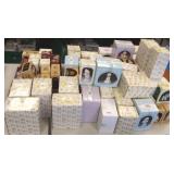 Large group of Precious Moments figures with boxes