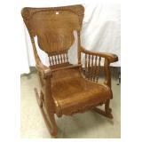 Fancy carved American oak rocker with arms