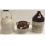 2 advertising stoneware jugs (tiny chip on one) &
