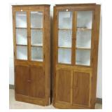 2 wooden corner cabinets