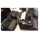 4 vintage typewriters- 3 in cases