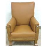 Leather upholstered mission oak arm chair with