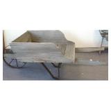 Primitive wooden wheel barrow