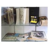 Group of postage stamps in albums & Polaroid