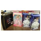 12 Barbies in boxes including Phantom of the Opera