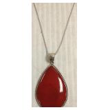 Large sterling pendant set with red coral on chain
