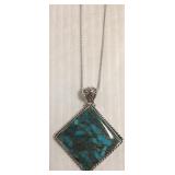 Large sterling pendant set with turquoise on chain