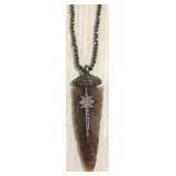 Hematite bead necklace with an arrowhead stone