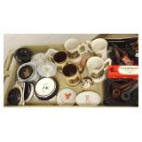 Group of smoking pipes, ashtrays, mugs, etc.