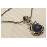 Sterling pendant set with blue stone on sterling