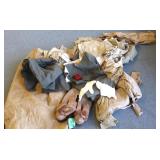 Group of Army uniforms including boots