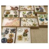Group of costume brooches, necklaces, earrings,