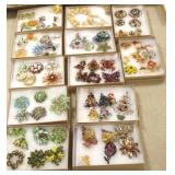 Group of costume brooches, necklaces, etc.