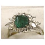 14k white gold ring set with emerald & diamonds