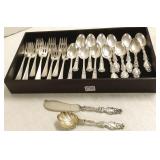 22 pieces of sterling flatware in 3 patterns
