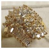 18K ring set with 29 round diamonds 1.50 cwt