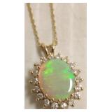14k gold pendant on chain set with large opal &