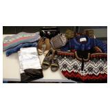 Group of wool sweaters, purses, shoes, etc.