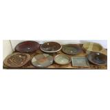 9 assorted pottery pieces- platters, bowls- some