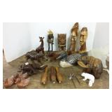 Group of carved wood figures, stone figures, etc.