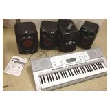 Stereo with speakers & a keyboard