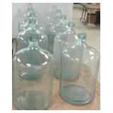 Group of 10- 5-gallon vintage Carboys bottles