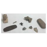 Group including platform pipe, obsidian effigy,