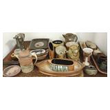 Large group of decorated studio pottery, platters