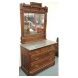 Antique Victorian walnut chest with beveled mirror