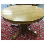 Round oak pedestal table