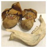 Pair of beaded moccasins & a jawbone