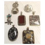 7 sterling, 800, etc. pendants- some set with